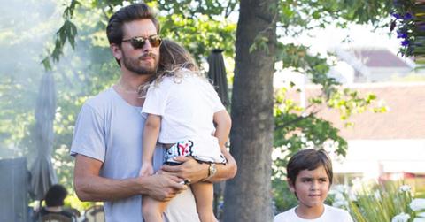 Scott disick carries sleepy penelope family dinner