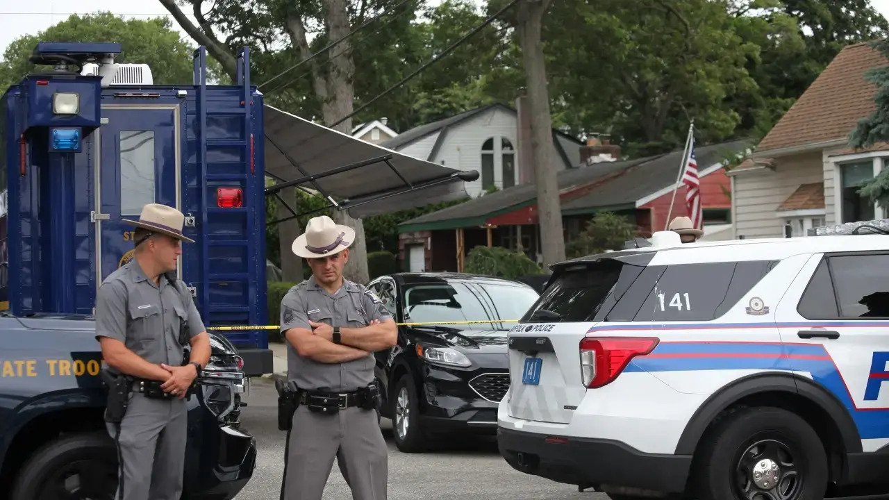 Cops waiting to arrest Heuermann in Summer 2023.