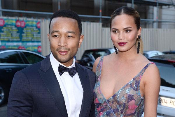 Chrissy Teigen Wears A Sheer Dress To The Vogue Paris Gala