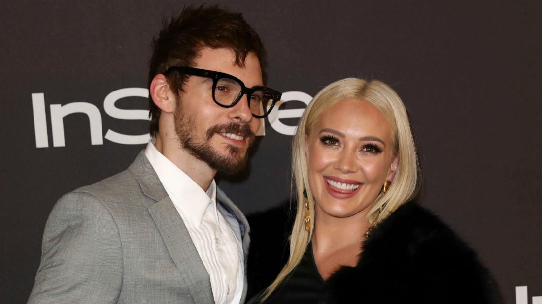 Matthew Koma and Hilary Duff walked the red carpet at an InStyle event with the Younger star wearing a black dress and Koma wore a grey suit jacket.