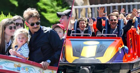 Bradley Cooper enjoys a day at Disneyland with his daughter Lea.