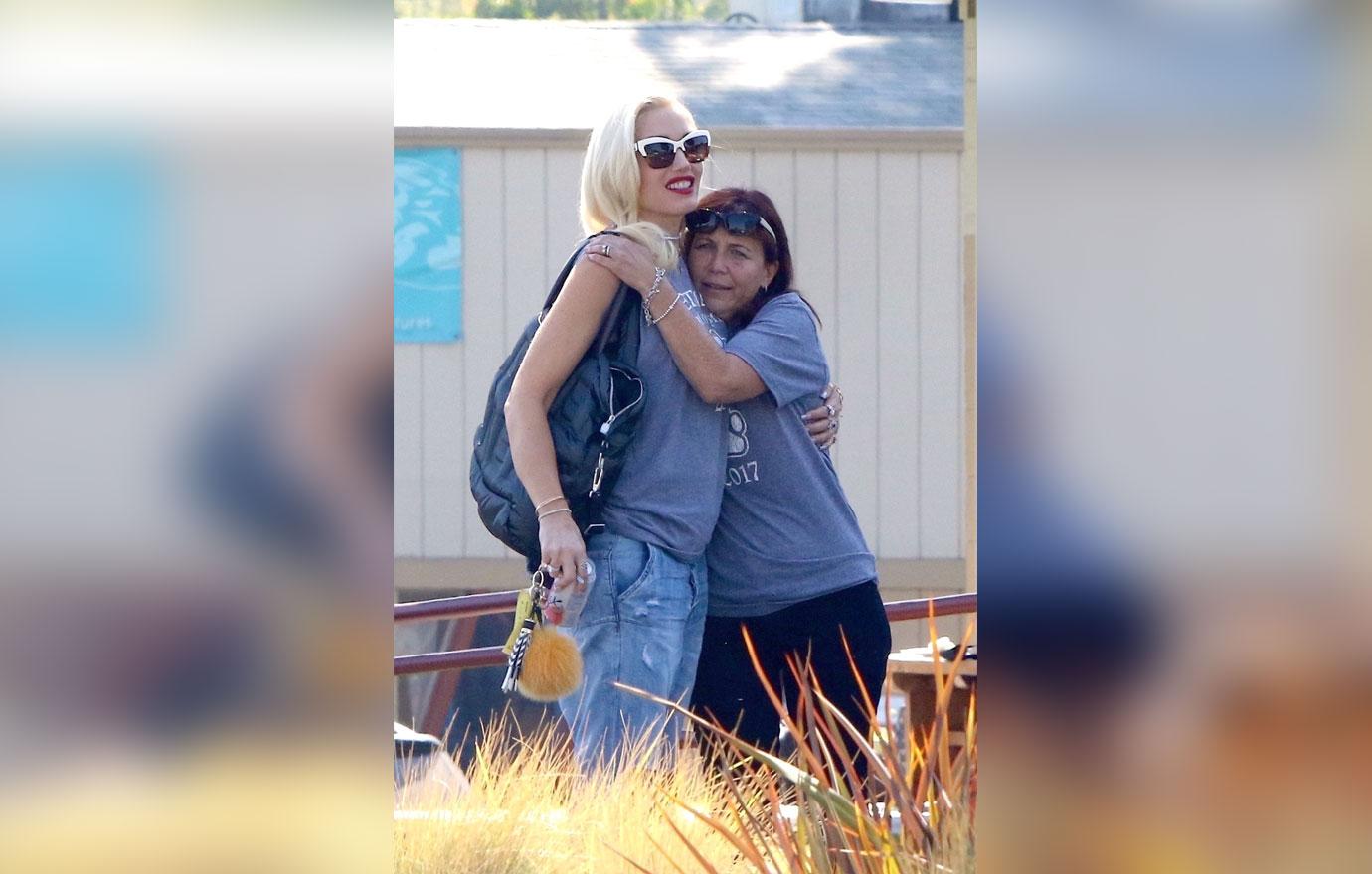 Gwen Stefani Holds Big Purse In Front Of Baby Bump