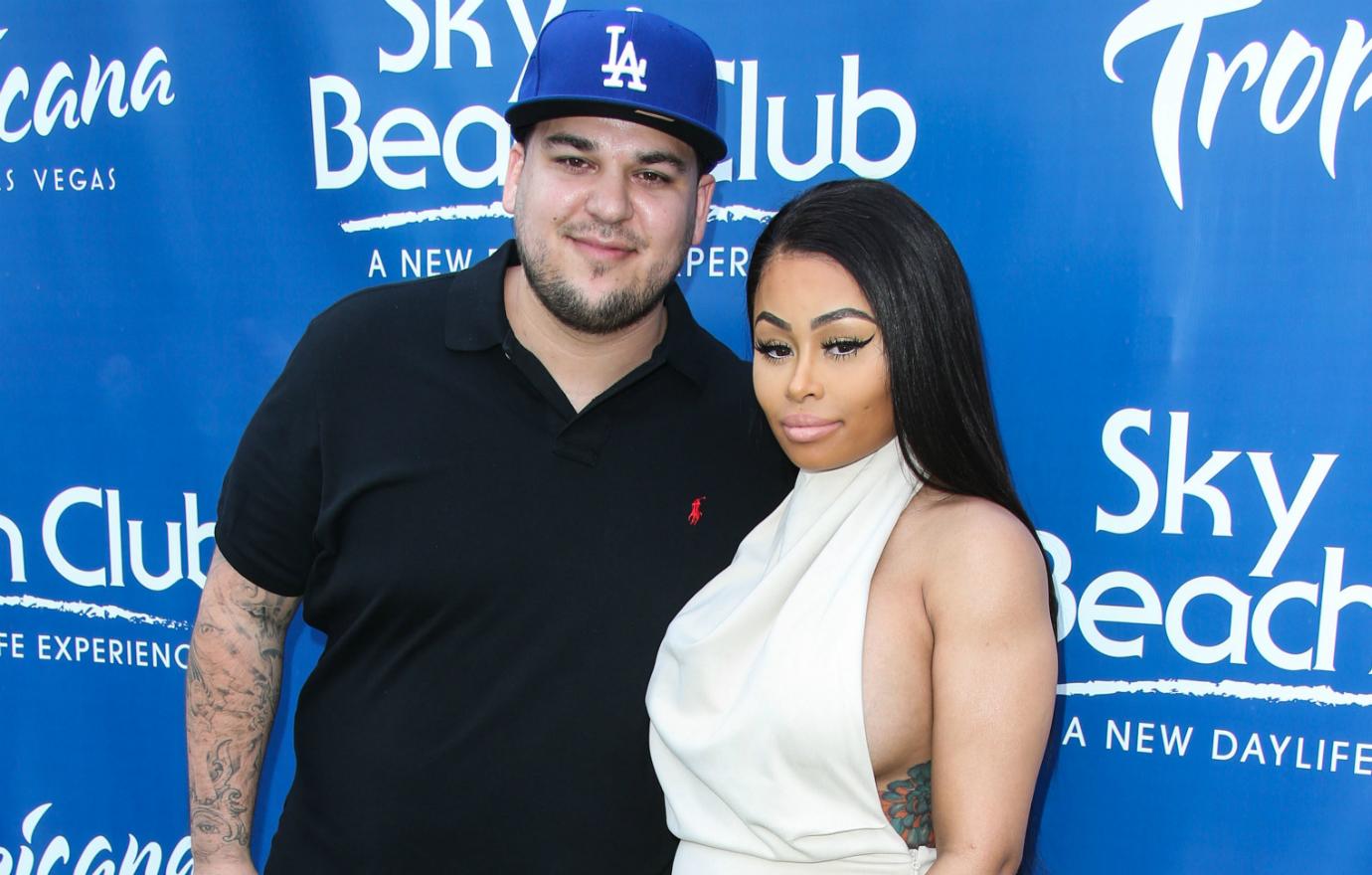 Rob Kardashian and Blac Chyna were seen at the Tropicana in Las Vegas with Kardashian in a black T-shirt and shorts (and his ever-present Dodgers hat) and Chyna in a white one-piece miniskirt.