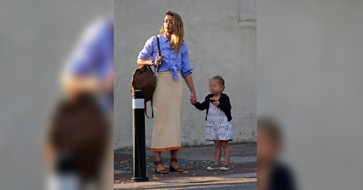 amber heard seen in madrid with daughter radar